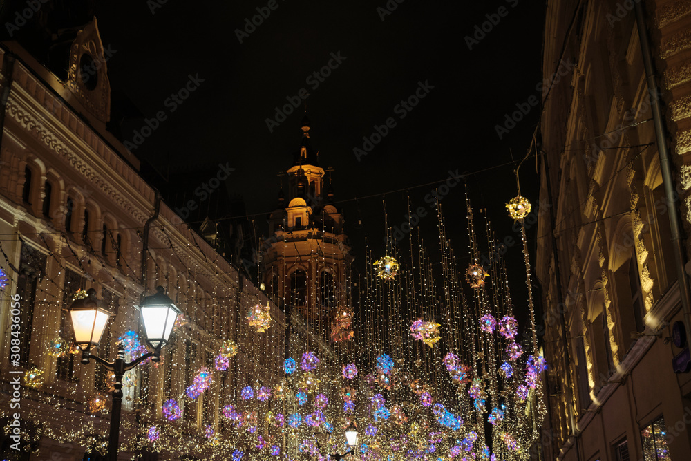 Wall mural balls decorations holidays for christmas tree branches near red square in moscow.