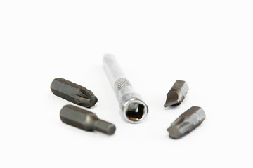 metal old nozzles and screwdriver for repair and installation