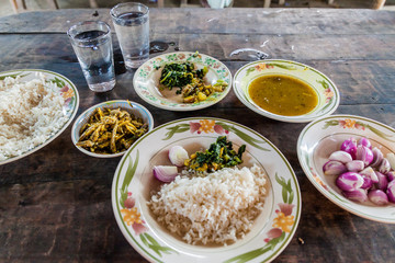 Meal in Bangladesh - Rice, Mola mach (small fish) and dhal