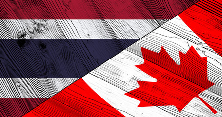 Flag of Thailand and Canada on wooden boards