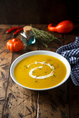 Homemade pumpkin soup with thyme and cream