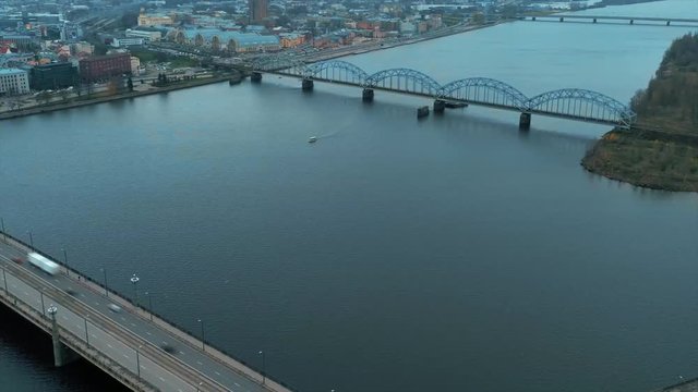 Top aerial view of the Daugava river in Riga, Latvia on a sunny day
