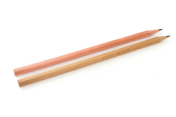 Brown pencil on white background