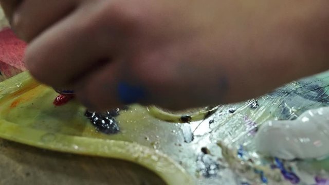 Artist copyist paint seascape with ship in ocean. Craftsman decorator draw as boat sail on blue sea with acrylic oil color. Draw finger, brush, knife palette. Indoor. Close up cinematic look. - Powered by Adobe