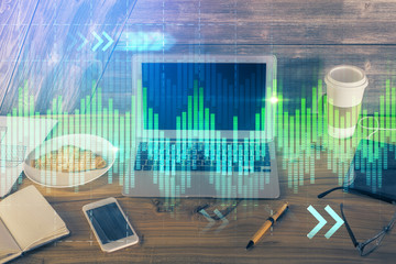 Multi exposure of chart and financial info and work space with computer background. Concept of international online trading.