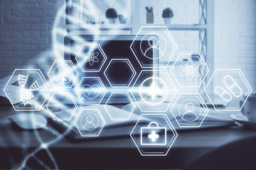 Desktop computer background and DNA drawing. Double exposure. Science concept.