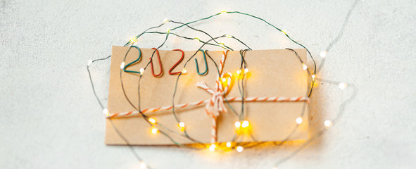 New Year and Christmas mood, holidays atmosphere. Envelope marked 2020.