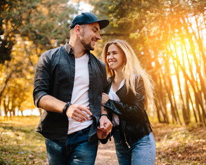 young couple on motorcycle laugh