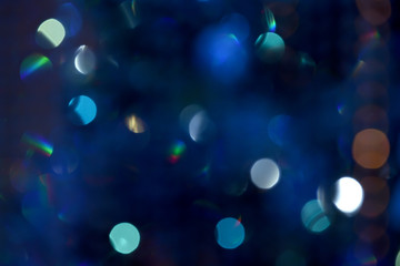 Abstract bright background. Multi-colored bokeh on a blurred background. Holiday mood