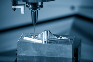 The CNC milling machine finishing cut the injection mold parts with the solid ball  endmill tools....
