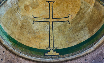 Cross as a sign of Christianity on the ceiling of a vault