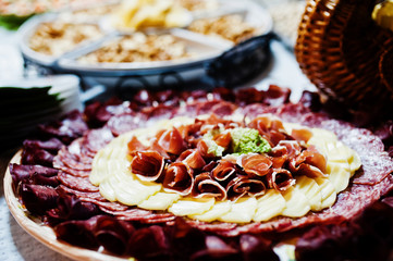 Dessert table of delicious snacks on wedding reception.