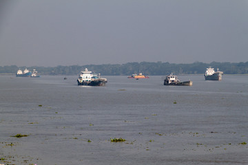 Fototapeta na wymiar MORRELGANJ, BANGLADESH - NOVEMBER 19, 2016: Small ships on Pangunchi river near Morrelganj village, Bangladesh