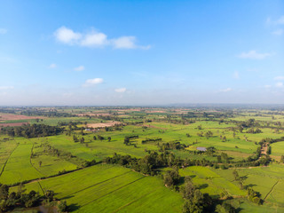 Fototapeta na wymiar Drone shot aerial top view scenic landscape the agriculture farm countryside and rural lifestyle