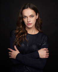 Obraz premium beautiful woman face over black background