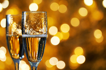 Two glasses of champagne on a blurred background. Celebration concept. Selective focus. Background...