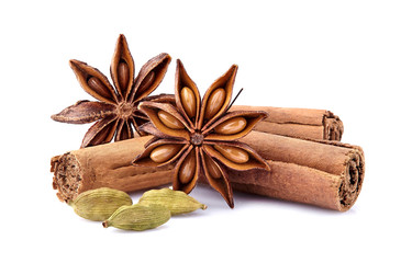 Anise  with cinnamon and cardamom on white background. Spices isolated.
