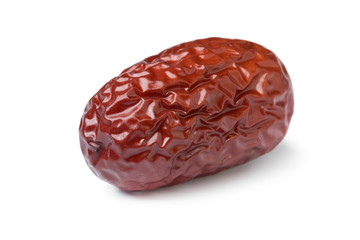 Single dried Chinese red date close up