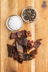Beef jerky pieces. Dried beef meat.