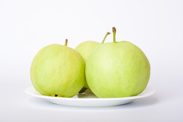Fresh organic guava tropical fruit on white background. Healthy food high vitamin C concept