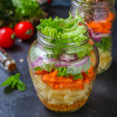 healthy salad in a jar (vegetable snack pasta salad) menu concept. food background. top view. copy space