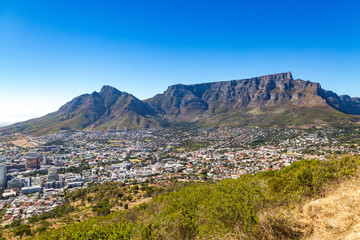 View over Cape Town, Devil's Peak and Table Mountain from Signal Hill on a sunny day, South Africa