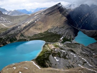 Views from a helicopter of the mountain lakes in Canada