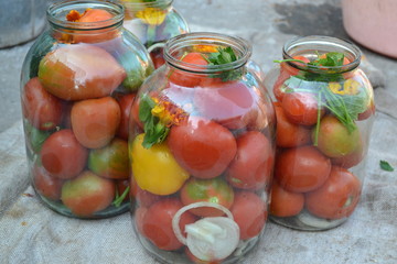 Pepper. Spice. Homemade food. Natural products from the garden. Village, cottage, farm, cellar. Tasty, healthy. Preservation. Blanks for the winter. Marinated. Red and yellow tomatoes in jars