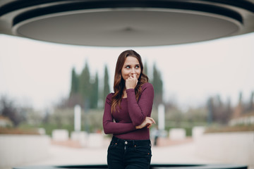 Portrait of young positive Woman with brown hair