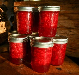 Selective Focus Closeup of mason jars of Red Strawberry jam