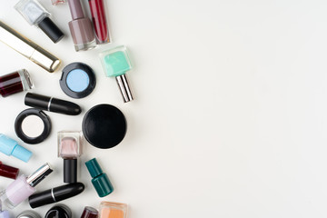 Top view of decorative cosmetic set on white