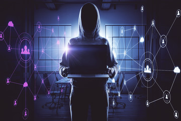 Hacker using laptop with glowing human resource interface