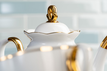 Close up photo of porcelain dishware for tea - obrazy, fototapety, plakaty