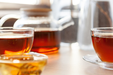 Close up of glass tea cup with honey