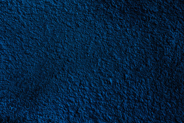 Abstract textured background in dark blue