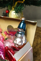 Vintage old Christmas toys laying in the box.