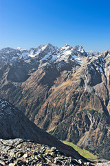 Colorful alpine landscape with snow, glaciers and rocky mountains at a beautiful day in autumn in the Oetztal Alps (Tirol, Austria).