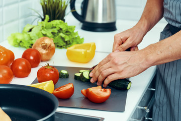 woman cutting vegetables in the kitchen
