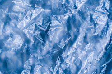 Pattern surface blue wrinkled plastic bags which are garbage and are pollution and environmental problems background close-up.