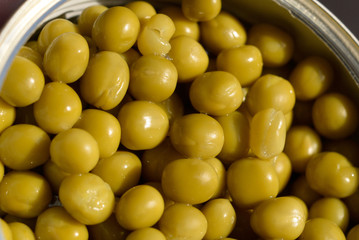 Canned green peas in a jar. Shallow depth of field