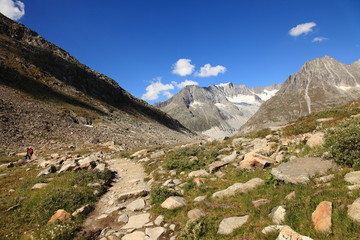 Beautiful mountain landscape with summits, valleys and waterfalls in the Swiss alps