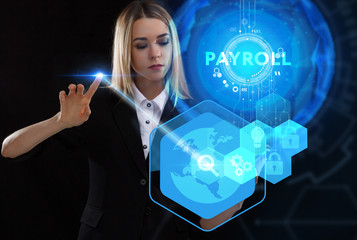 Business, Technology, Internet and network concept. Young businessman working on a virtual screen of the future and sees the inscription: Payroll
