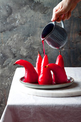 Spiced hibiscus or red wine poached pears. Delicious winter french dessert
