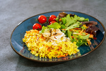 Andalusian fish, saffron rice with vegetables