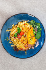 pasta and chicken on the table