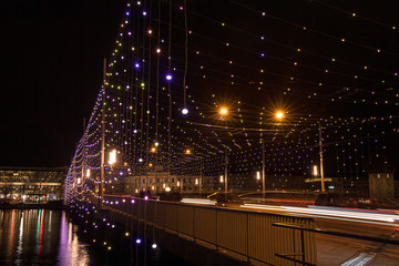 Fototapeta na wymiar Weihnachtsbeleuchtung der Seebrücke in Luzern, Schweiz