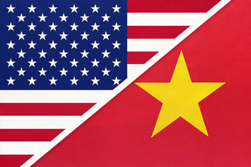 USA vs Vietnam national flag from textile. Relationship between two american and asian countries.