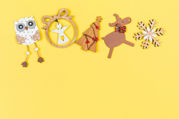 Top view Christmas toys and decorations on colorful background. New Year holiday concept with copy space