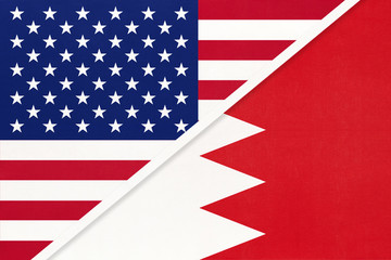 USA vs Bahrain national flag from textile. Relationship between two american and asian countries.