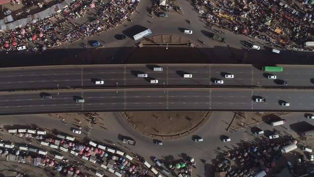 A 90 degree aerial shot of Nairobi Githurai market roundabout and Thika Highway traffic